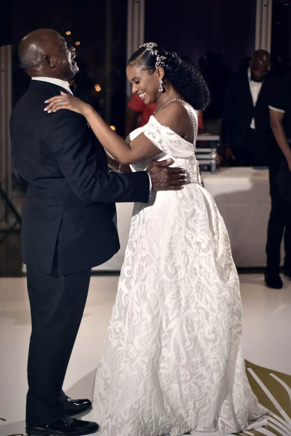Bride sharing a dance at her wedding reception